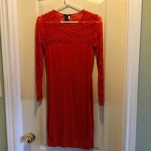 tight body con orange lacey knee length dress